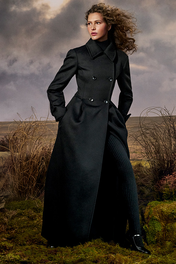 Max Mara Untamed Heroine campaign look with long coat, leggings and plain black Mary Janes.